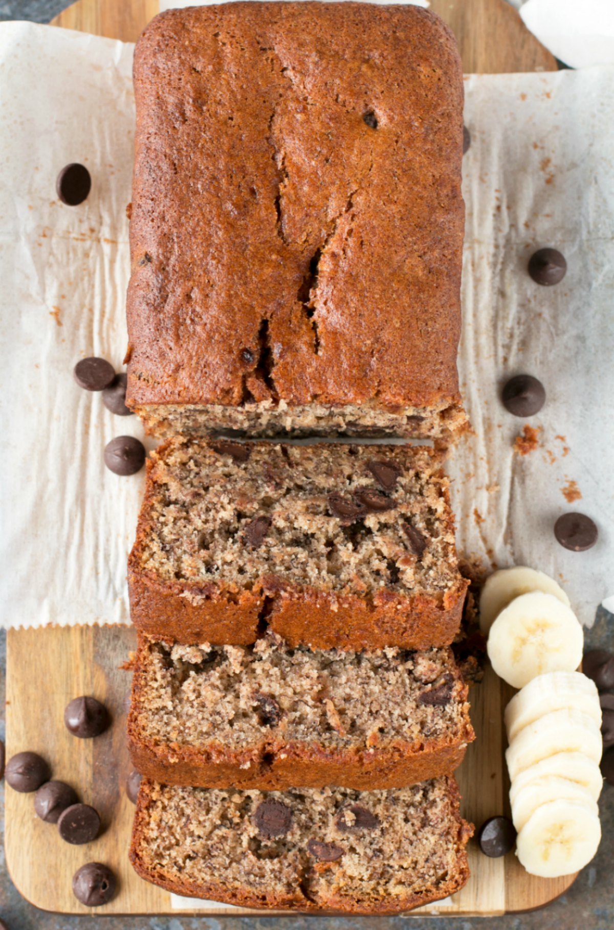 Overhead picture of chocolate chip banana bread sliced on cutting board