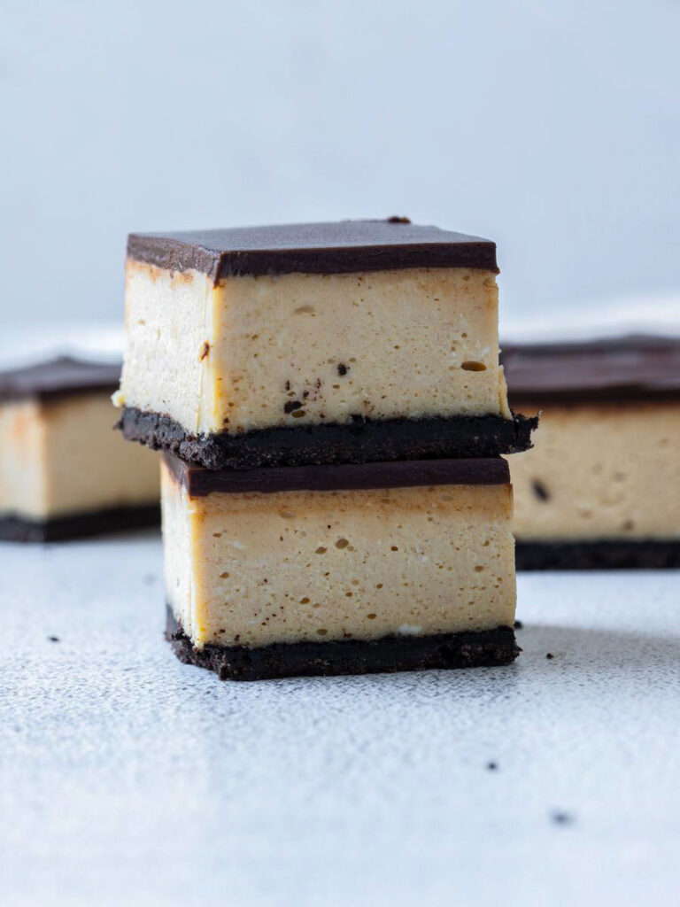 a stack of the cheesecake bars