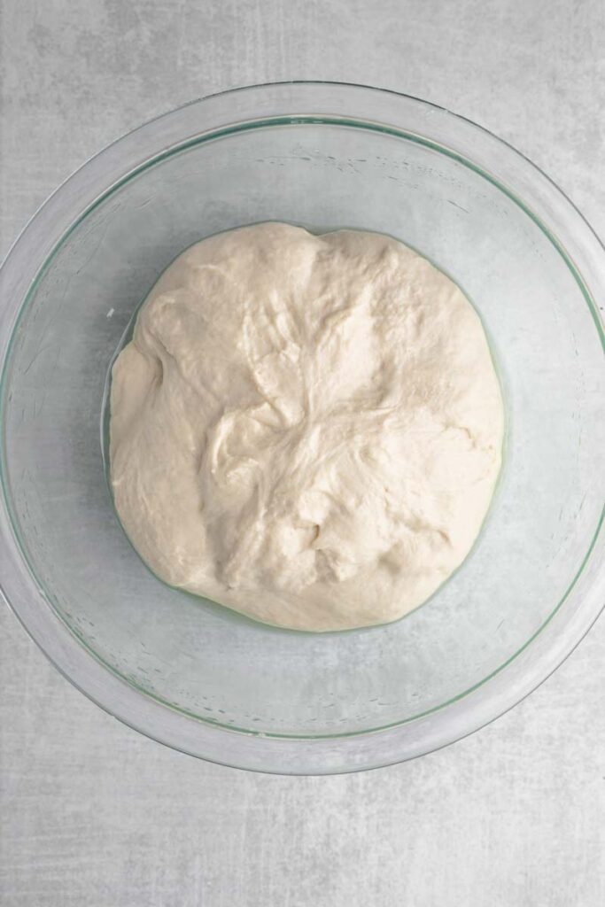 Dough resting in a bowl.