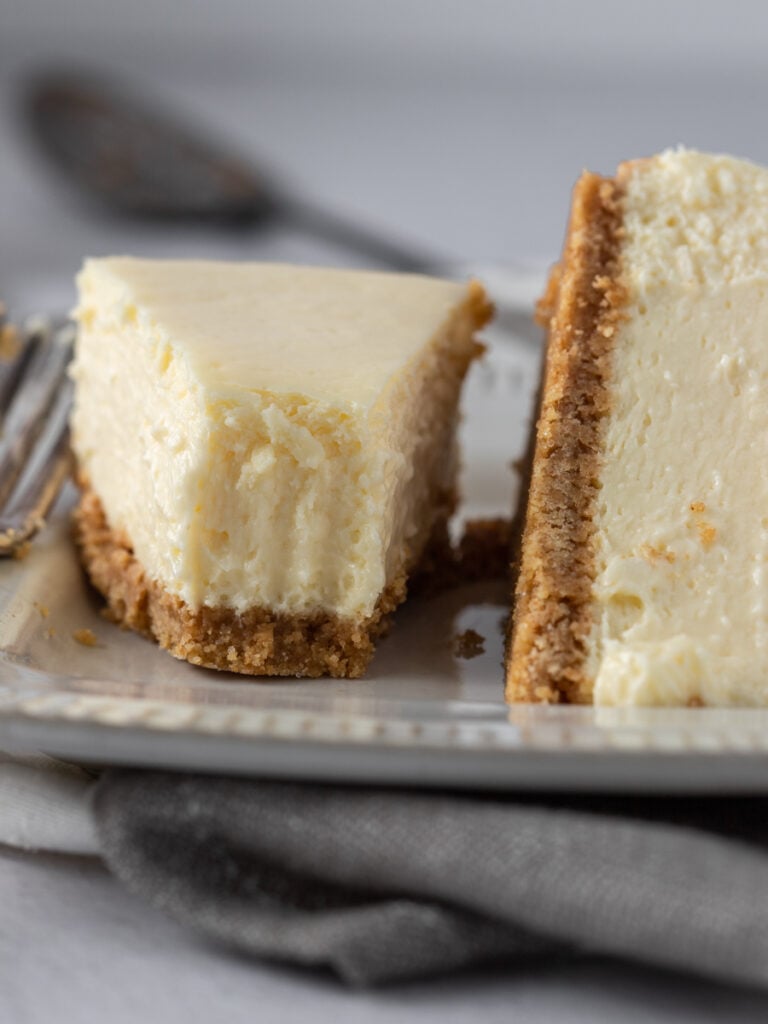 Close up of slices of cheesecake.