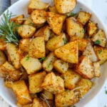 Overhead image of a bowl of air fryer crispy potatoes.