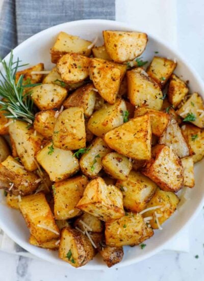 Overhead image of a bowl of air fryer crispy potatoes.