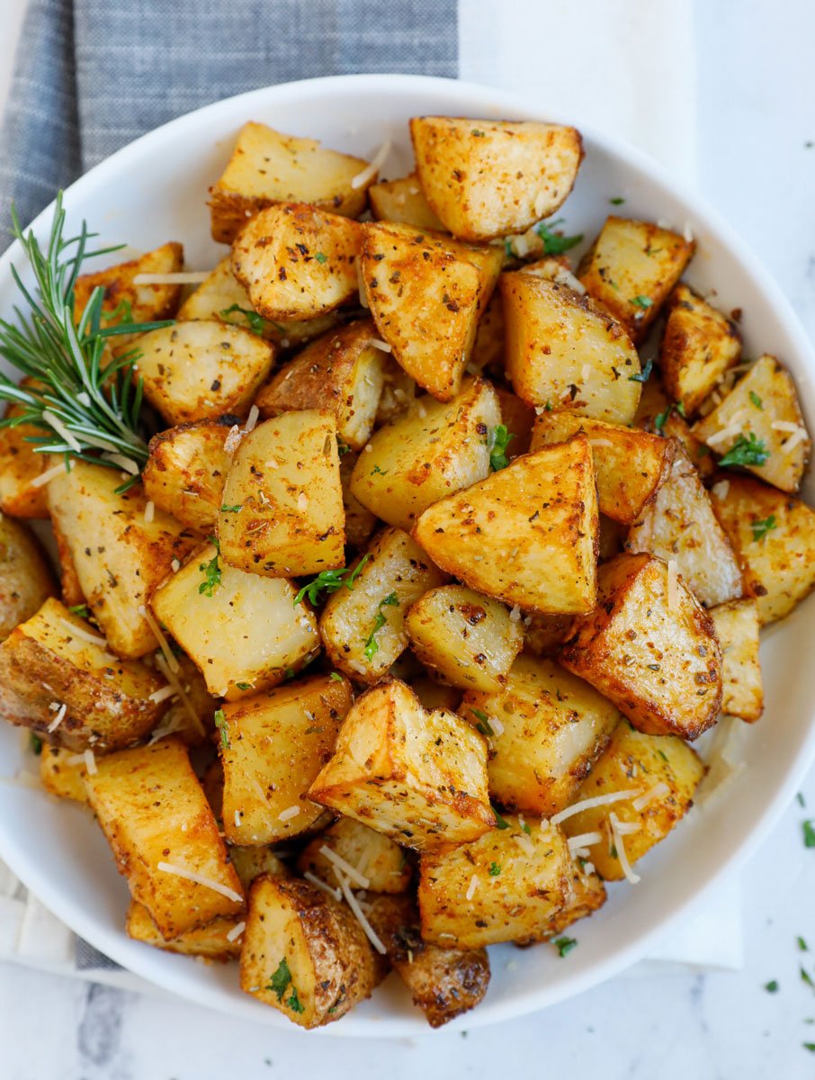 Overhead image of a bowl of air fryer crispy potatoes.