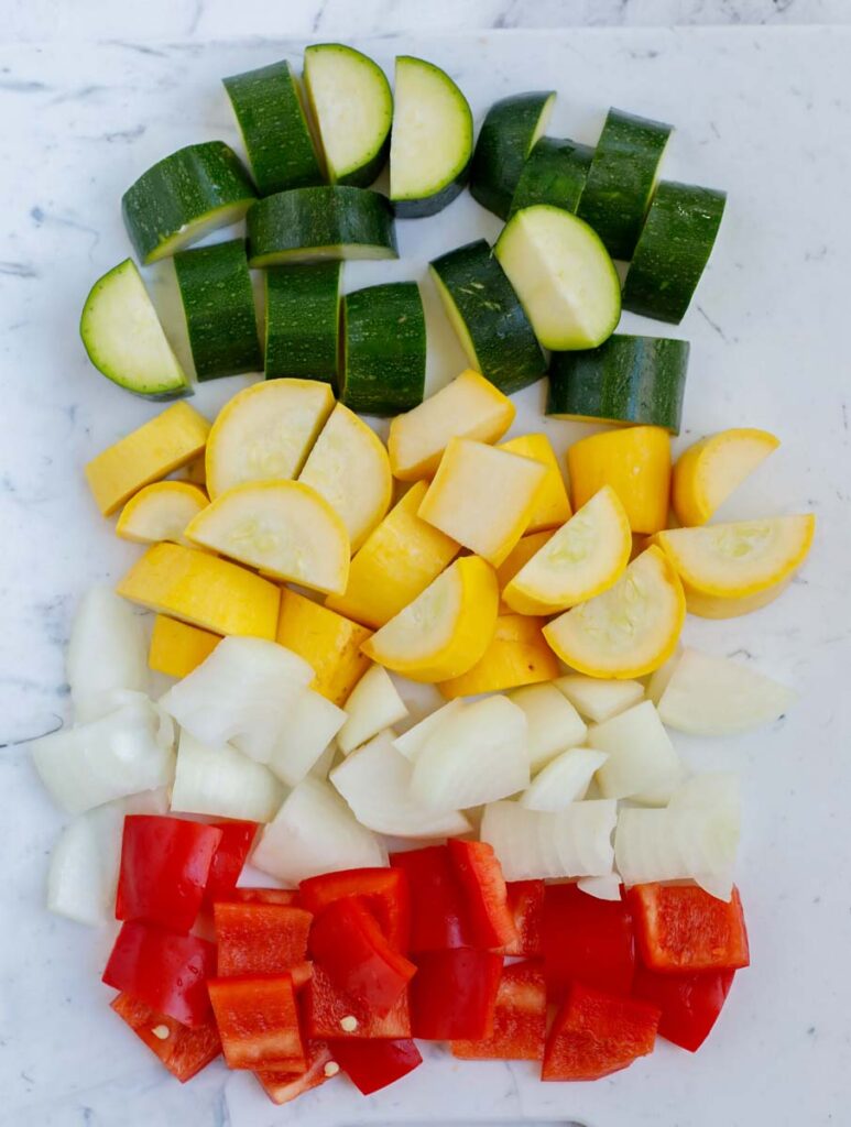 Diced vegetables on a table top.