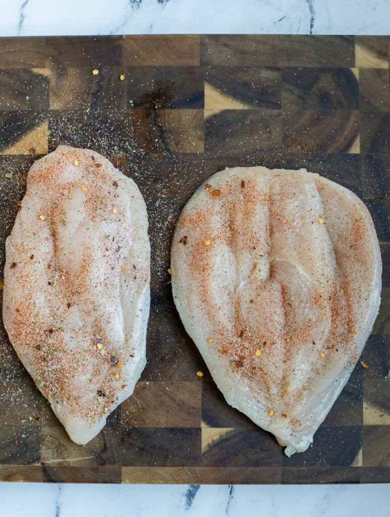 Chicken breast with seasoning.