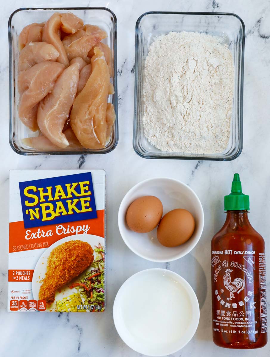 Top down view of ingredients for crispy chicken tenders.