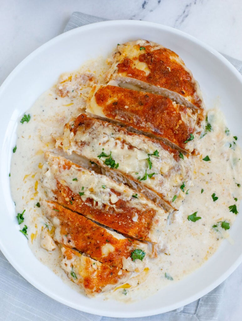 Caesar chicken sliced and in a plate.