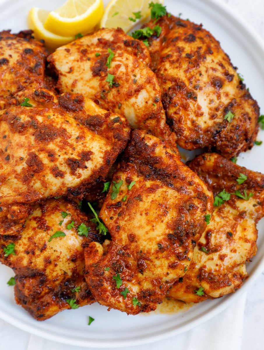 Top down view of air fried chicken thighs.