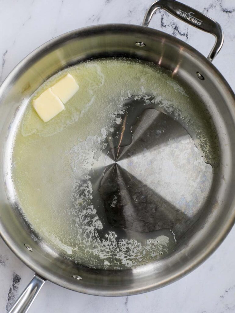 Butter in a pan.