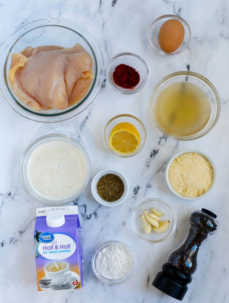 Ingredients needed to make creamy skillet chicken.