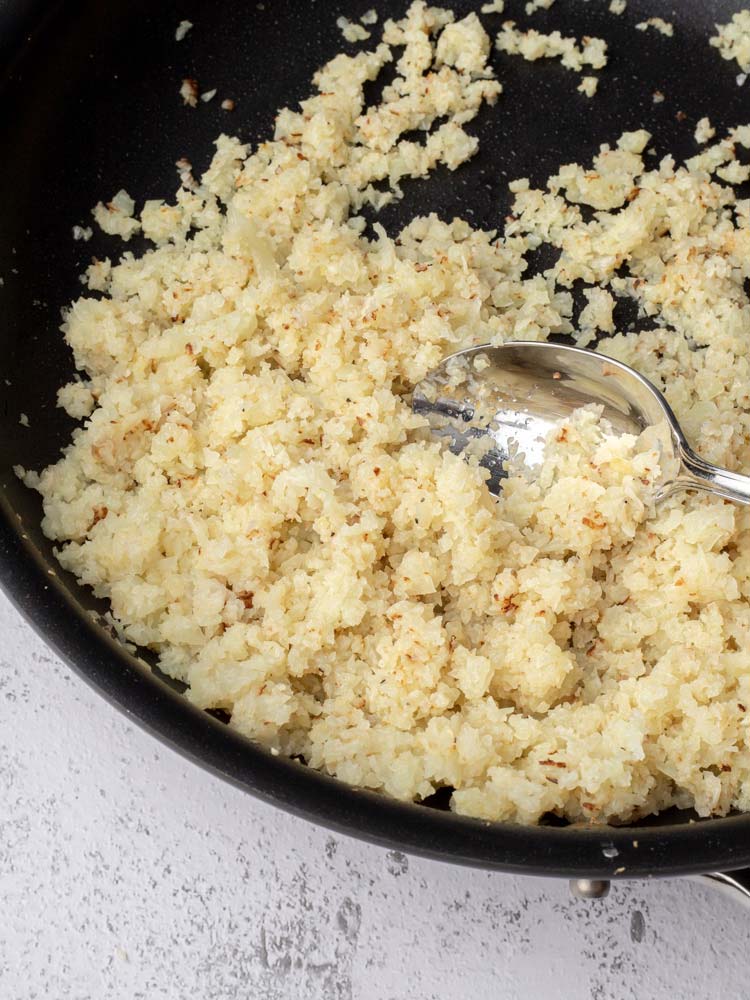 cauliflower rice on stove top skillet