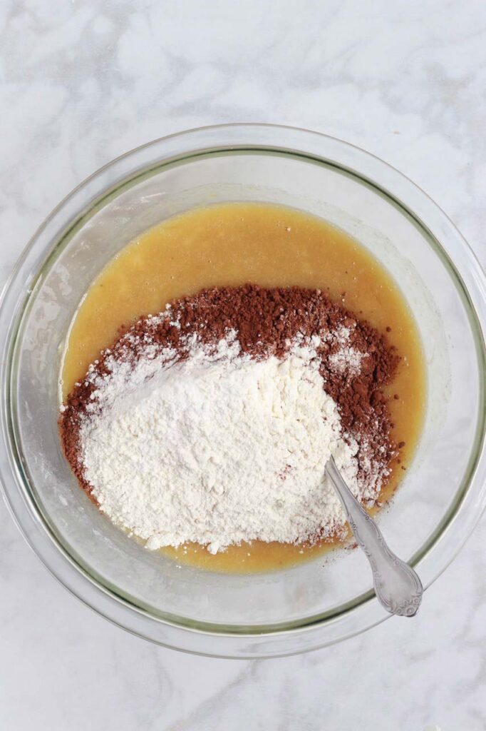 chocolate banana bread ingredients in a bowl before mixing