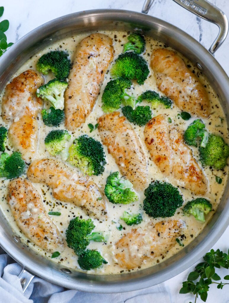 Top down view of creamy broccoli chicken in a big pot. 