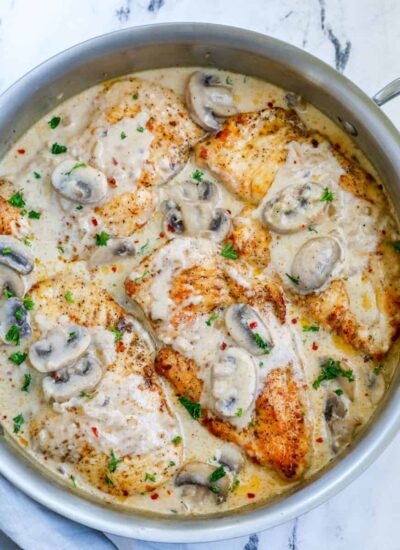 Top down shot of creamy mushroom chicken in a pot.