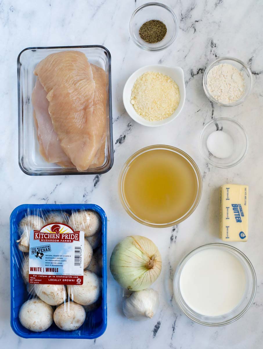 Top down shot of ingredients for creamy mushroom chicken.