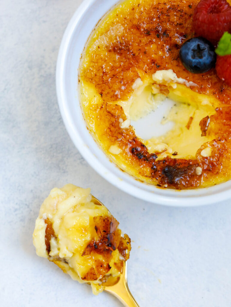 Easy crème brûlée with a spoonful taken out.