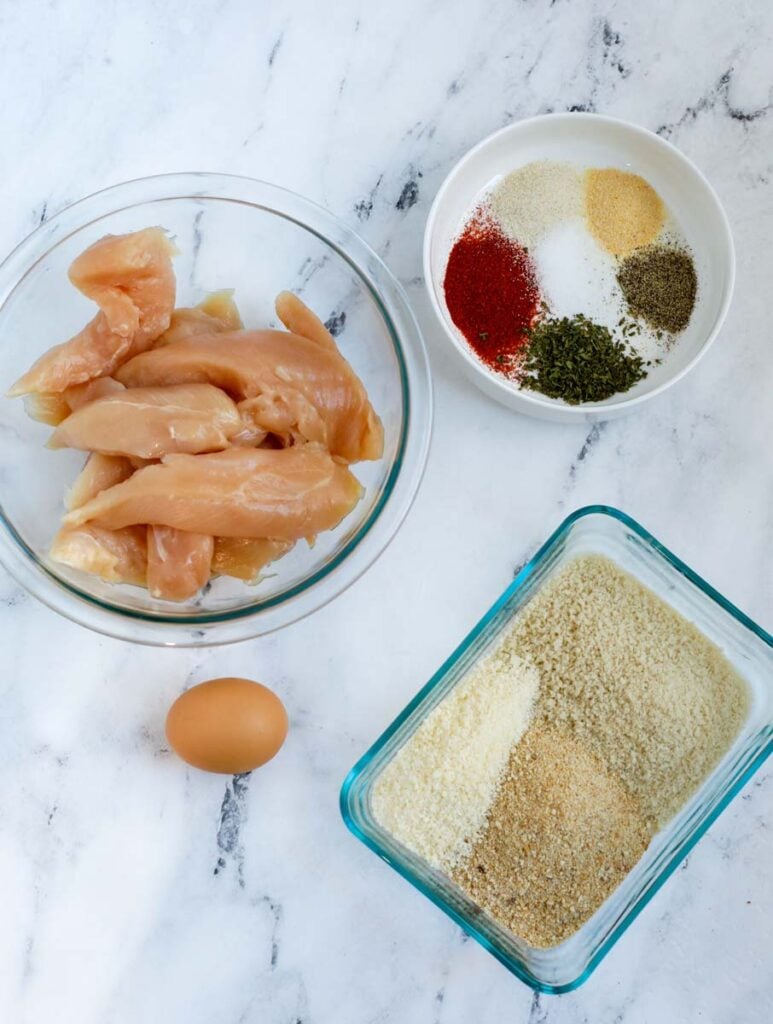 Ingredients for crispy air fryer chicken strips.