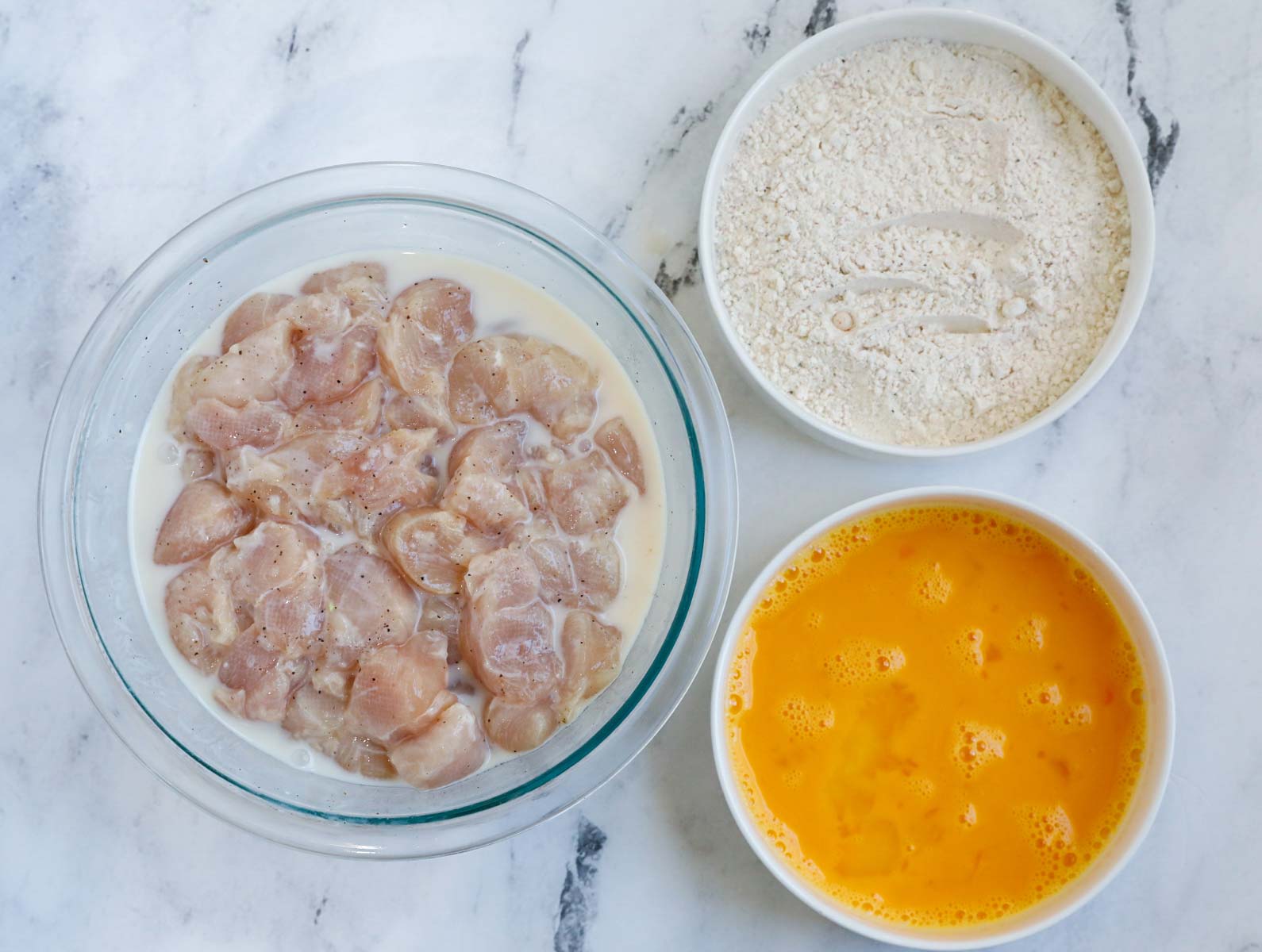 Top down shot of ingredients for chicken nuggets.