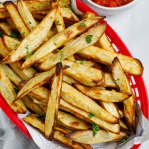 Top down shot of sweet potato fries in a basket.