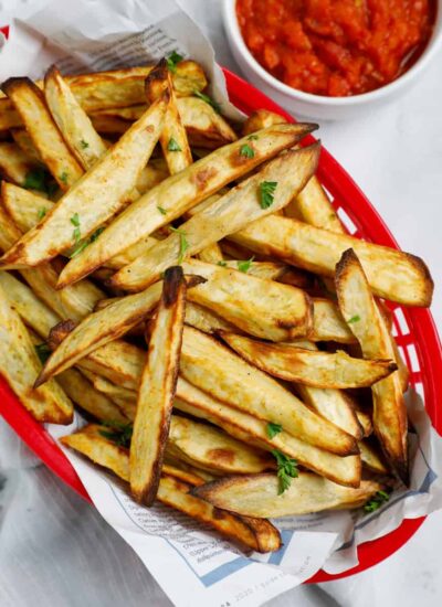 Top down shot of sweet potato fries in a basket.