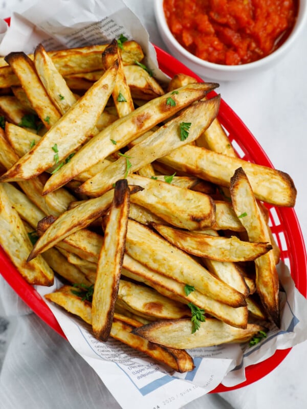 Top down shot of sweet potato fries in a basket.