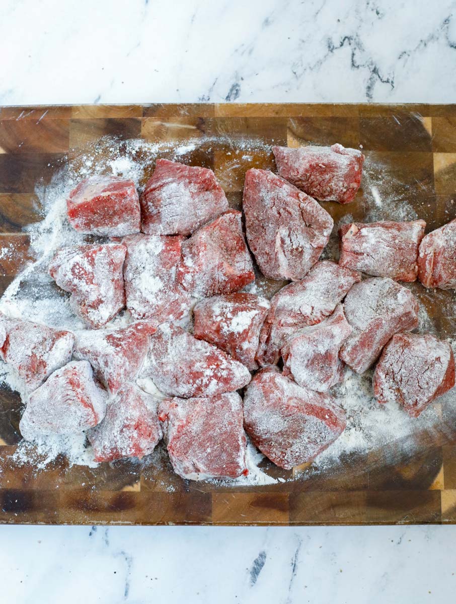 Beef stew cubes covered in flour.