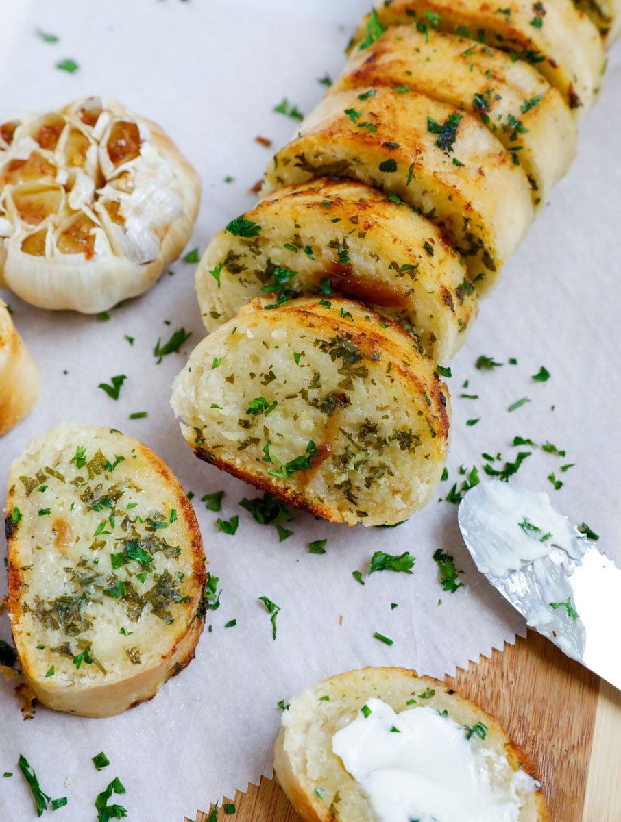 Slices of easy garlic bread on parchment.