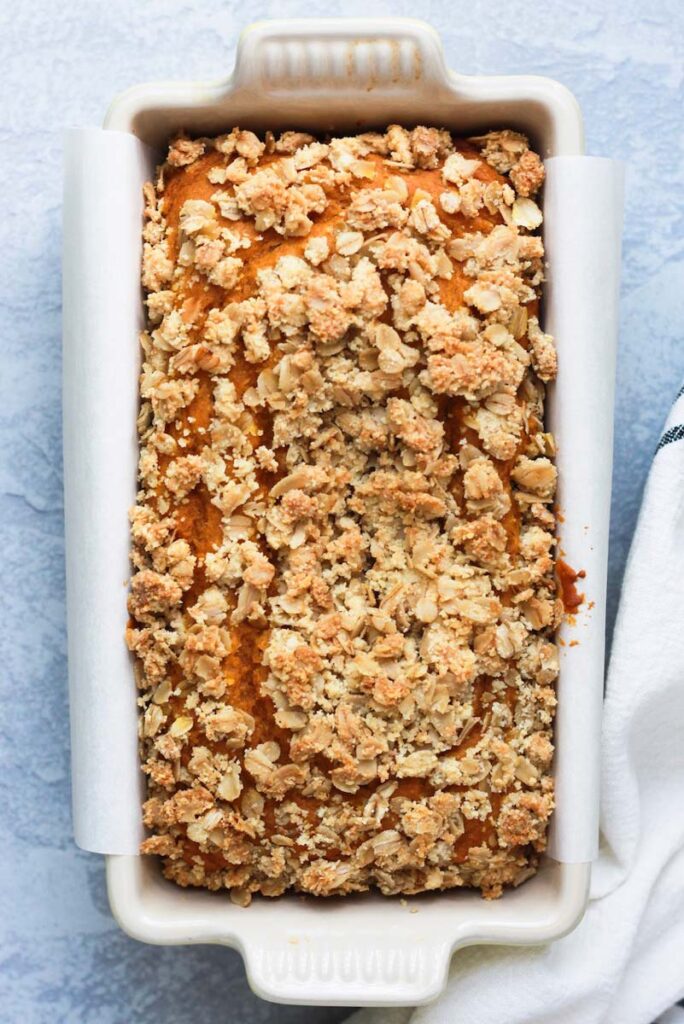 Overhead shot of easy pumpkin bread in a white loaf pan.