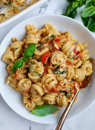 Overhead photo of a baked feta pasta in a bowl.