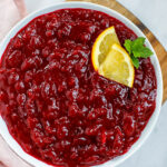 top down view of cranberry sauce served in a while dish