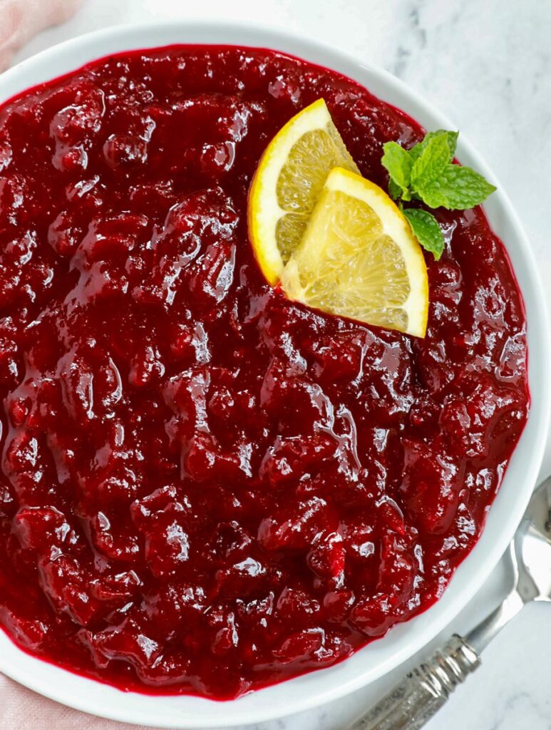 top down view of cranberry sauce served in a while dish