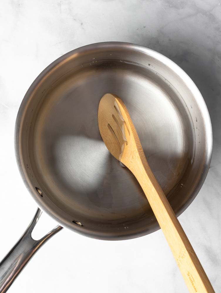 hot water in a pot with a spoon