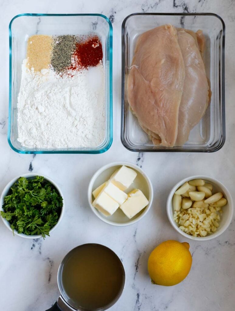 Top down shot of ingredients for lemon and garlic chicken.