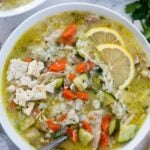 Overhead view of a bowl of lemon chicken rice soup.