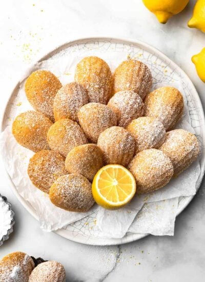 A white plate of lemon madeleines.