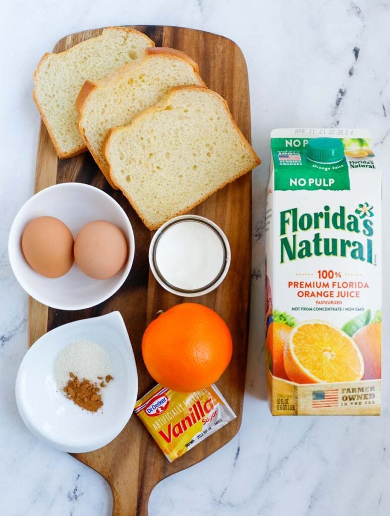 Ingredients needed to make orange French toast.