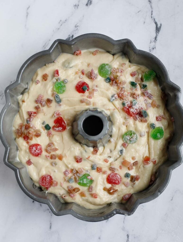 cake batter topped with dried fruits