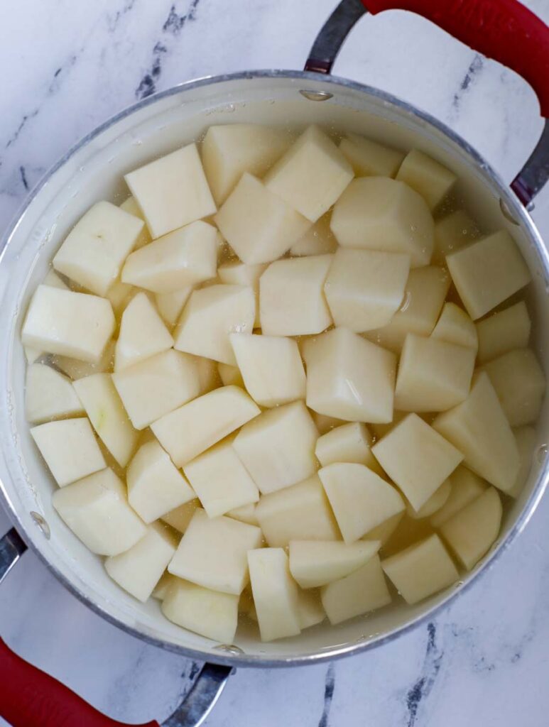 Diced potatoes in a pot.