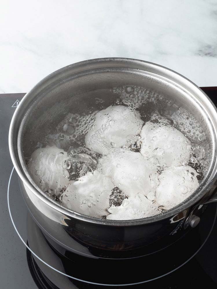 eggs boiling in a pot