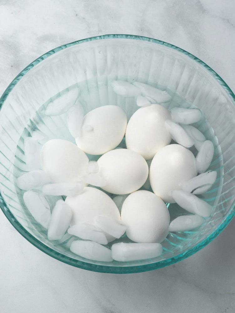 boiled eggs in a bowl of ice water