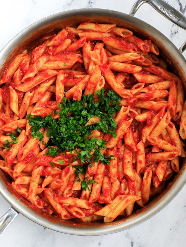 Pasta mixed with pasta sauce.
