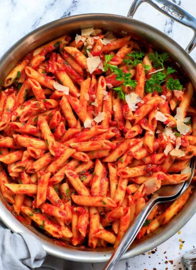 Top down shot of spicy arrabbiata pasta in a pot.