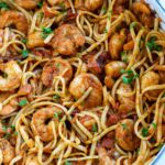 Overhead shot of spicy shrimp pasta in a skillet.