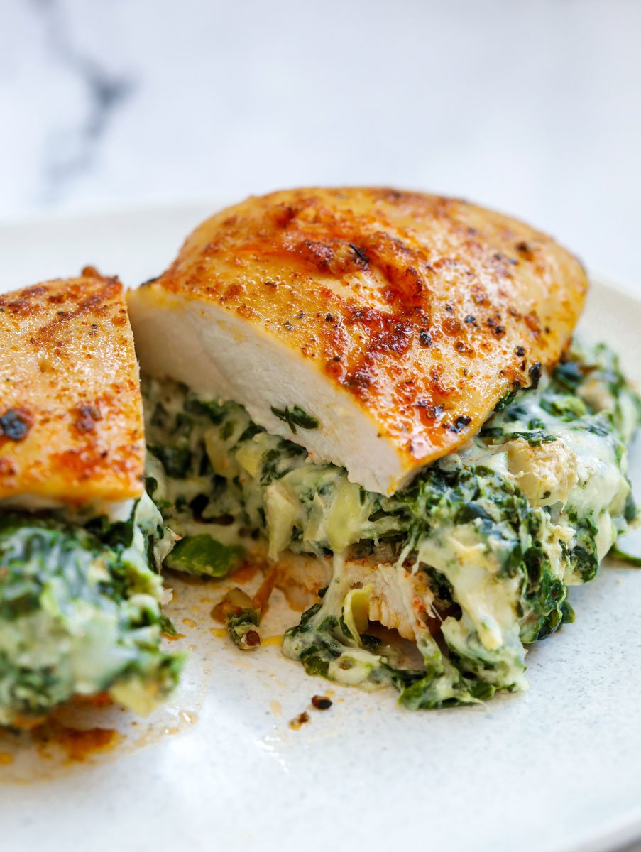 Close up of Spinach stuffed chicken breast cut in half.