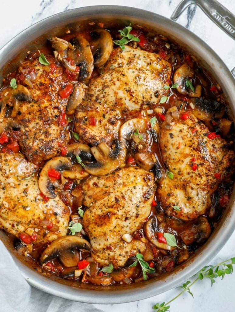 Overhead view of Tuscan Chicken in a pan.