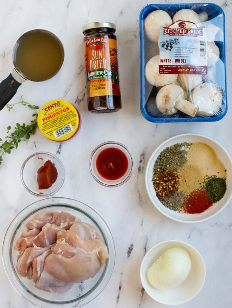 Top shot of ingredients for tuscan chicken recipe.