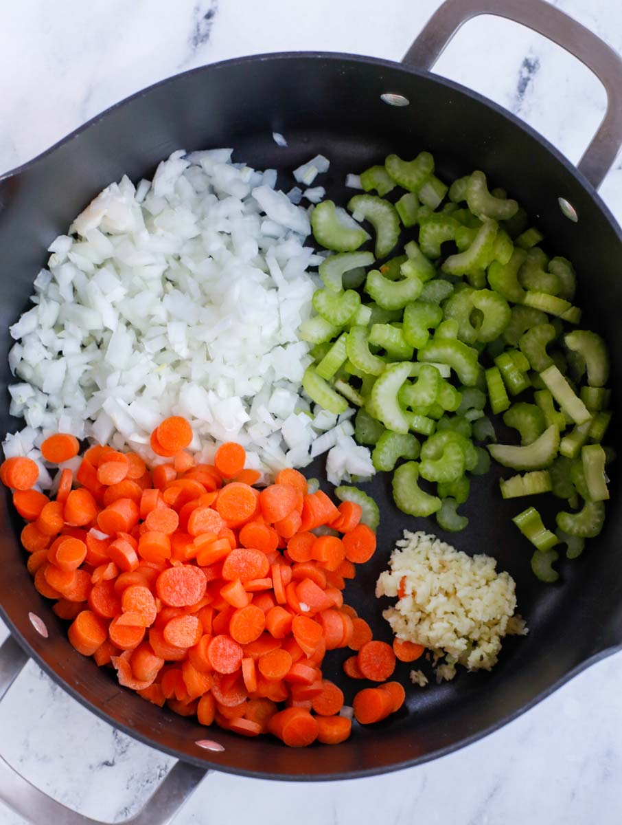 Vegetables to be sauted in a pot.