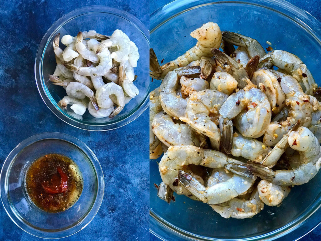 raw shrimp in a bowl next to a bowl of marinade