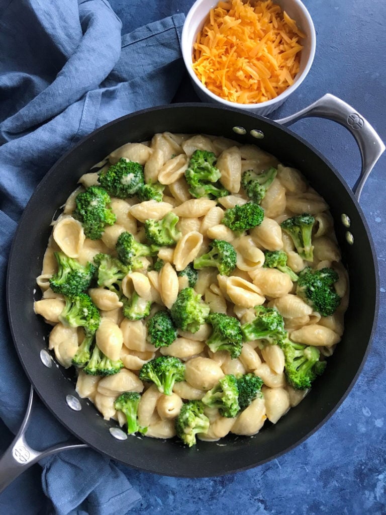 Overhead view of pasta in a skillet. 