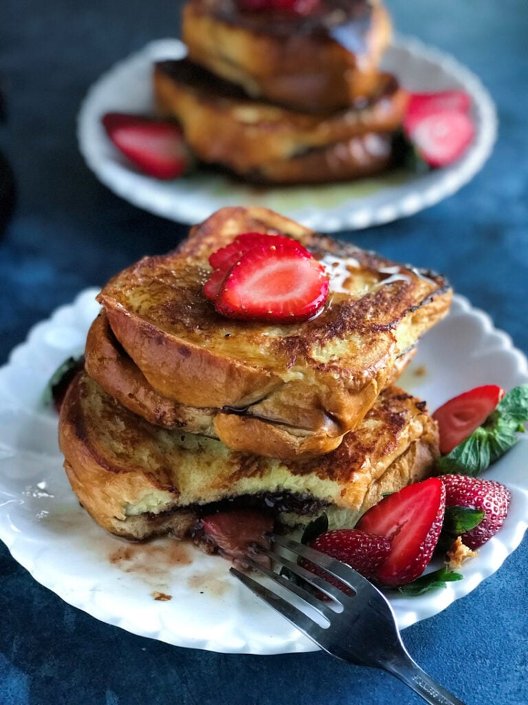 Strawberry nutella french toast with a fork.